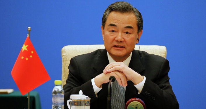 Ministro dos Negócios Estrangeiros chinês, Wang Yi, fala durante a Reunião Rússia Índia China-Ministros das Relações Exteriores 13 ', em Diaoyutai State Guesthouse em Pequim